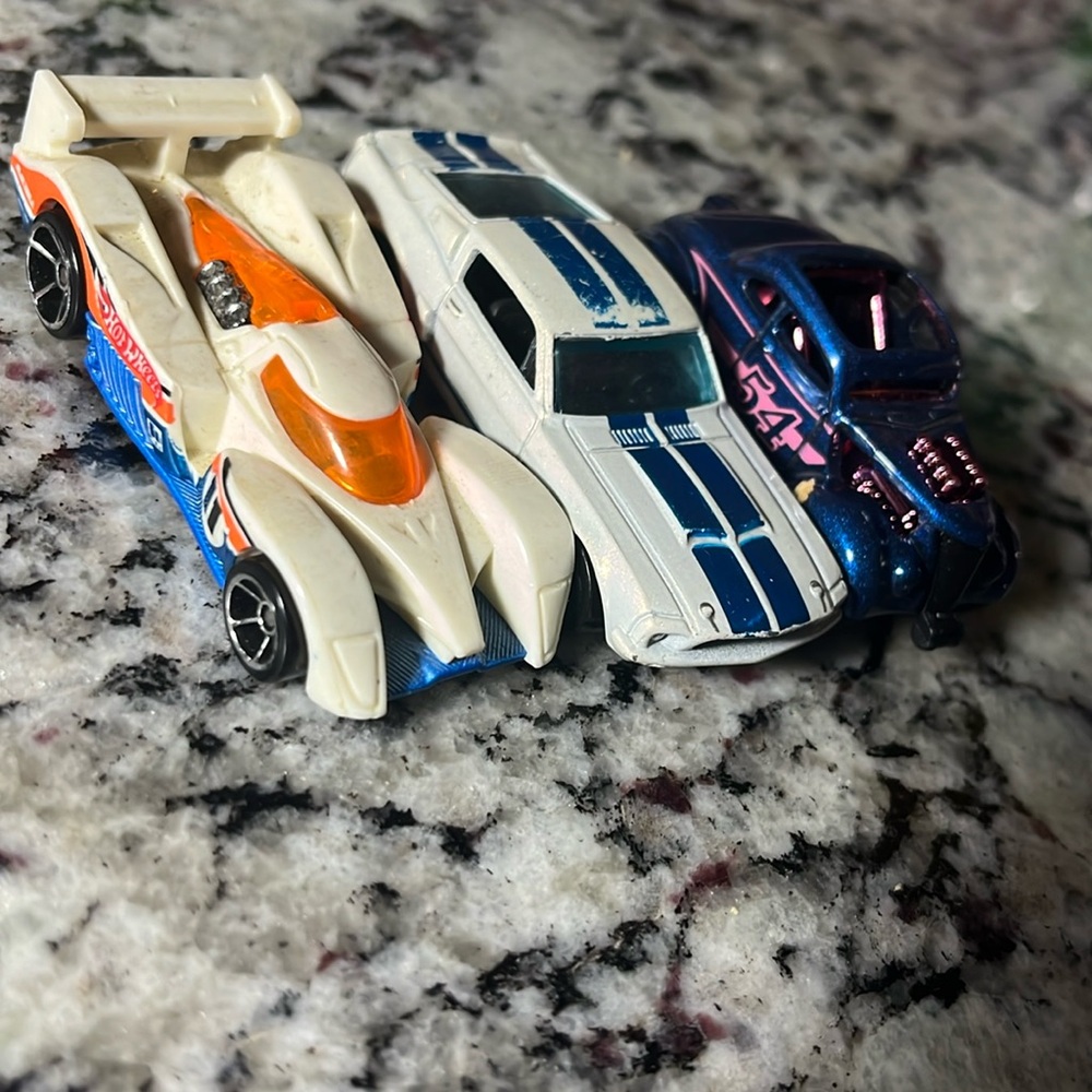 Three old cars